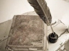 stock-photo-old-book-quill-and-bottle-of-black-ink-on-old-wooden-chair-version-12109999nn